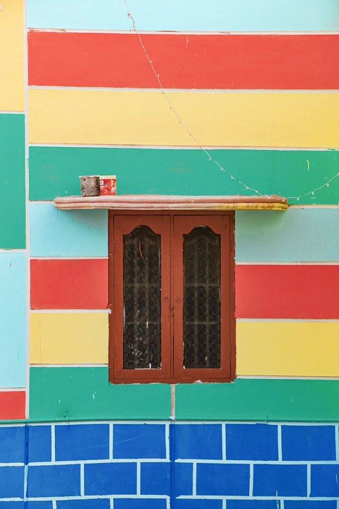 color splash walls of a house in Manapad.