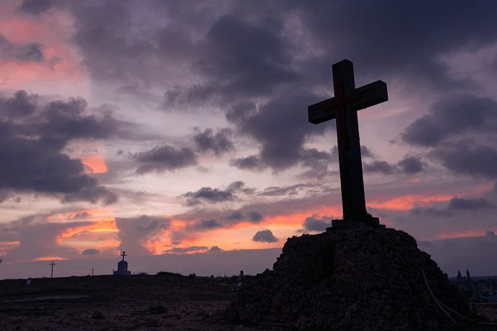 Faith Unshaken Two cross relics at sunset.