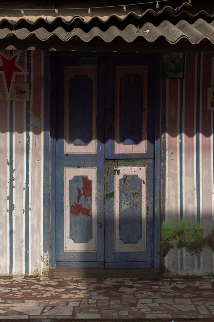 gentle lines, a doorway of a house in Manapad.