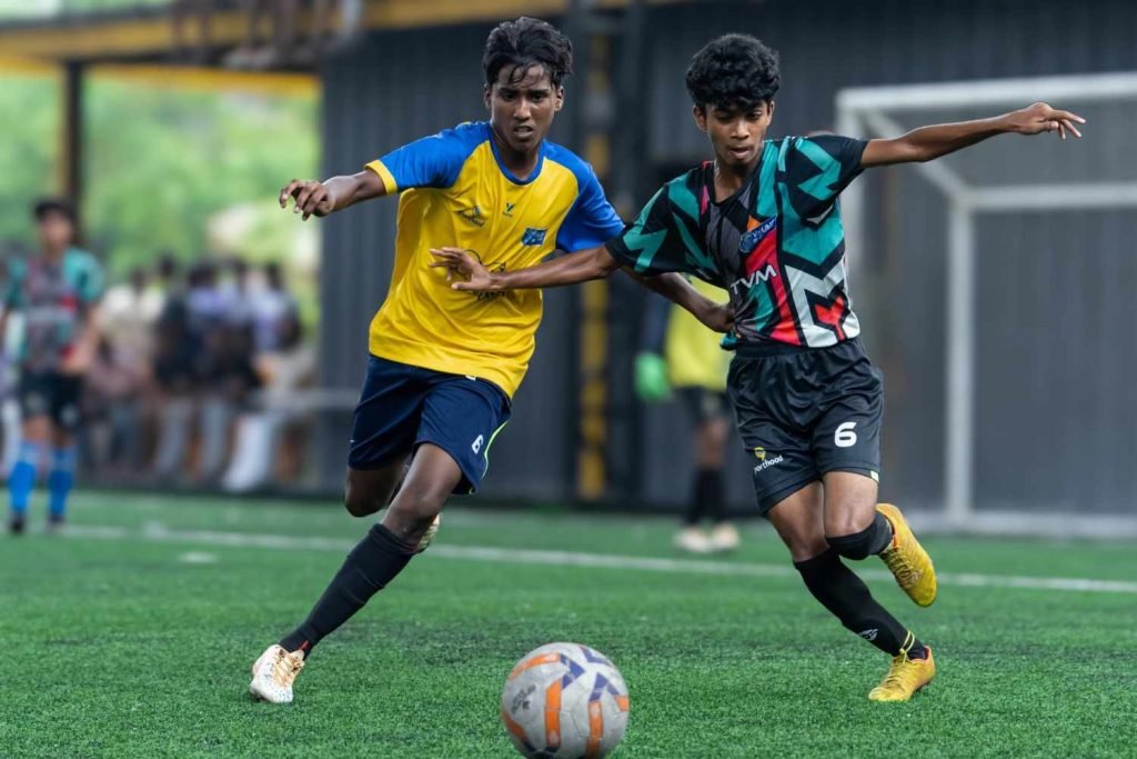 two player chasing for the football