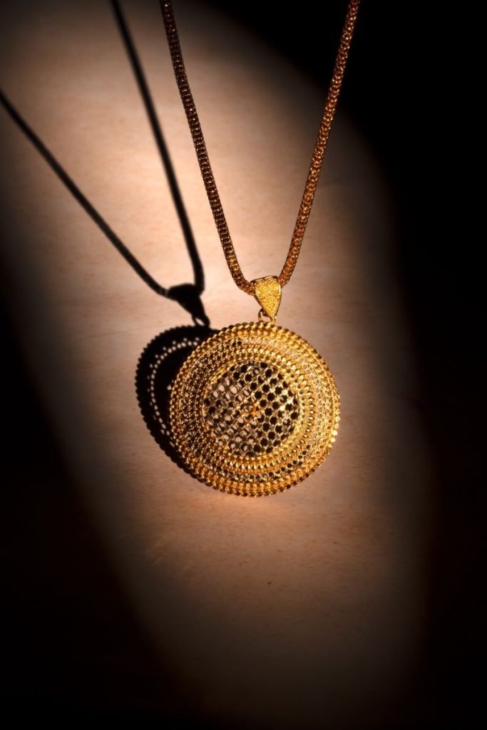 refined craft golden chain under the shadow