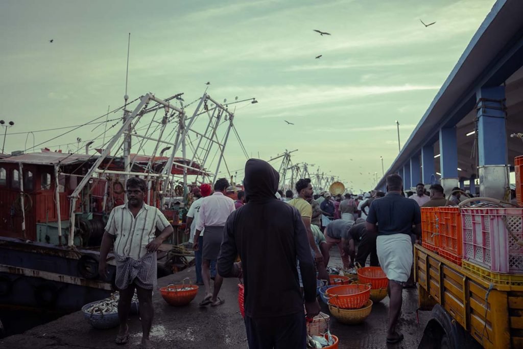 A man stepping into the market.