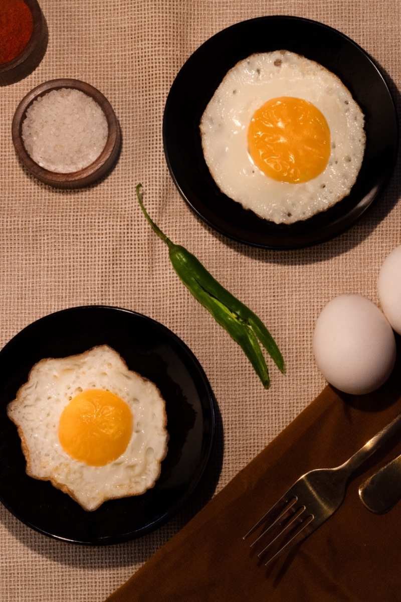 Two sunny delight eggs in two plates.