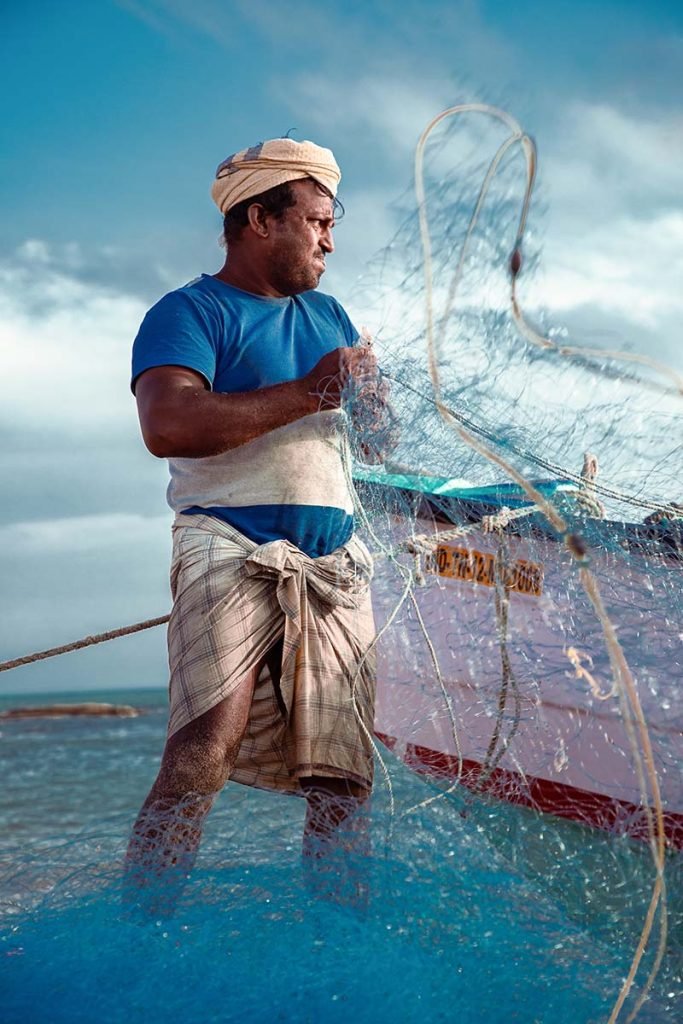 threaded resolve of a fisherman mending nets